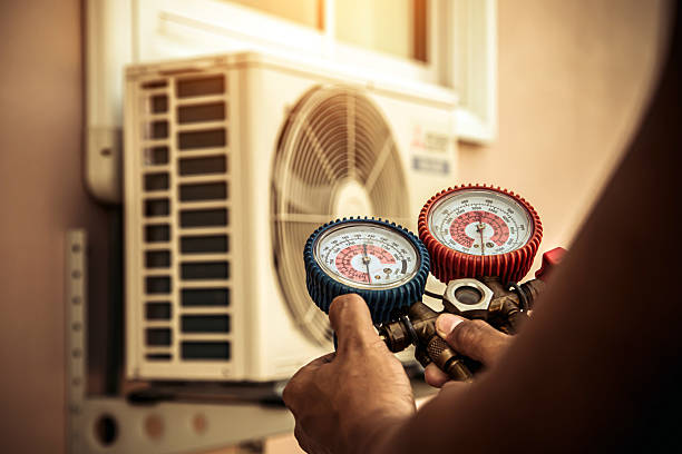 Professional Air Conditioning Service technician working in Reading, PA